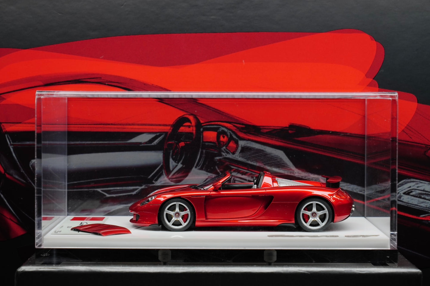 MAKE UP 1:43 Porsche Carrera GT 2004 resin model car! Rear wing lift version! Exquisite candy red metallic paint color Perfect match with all black interior! With independent open and close top! With acrylic large base display box!